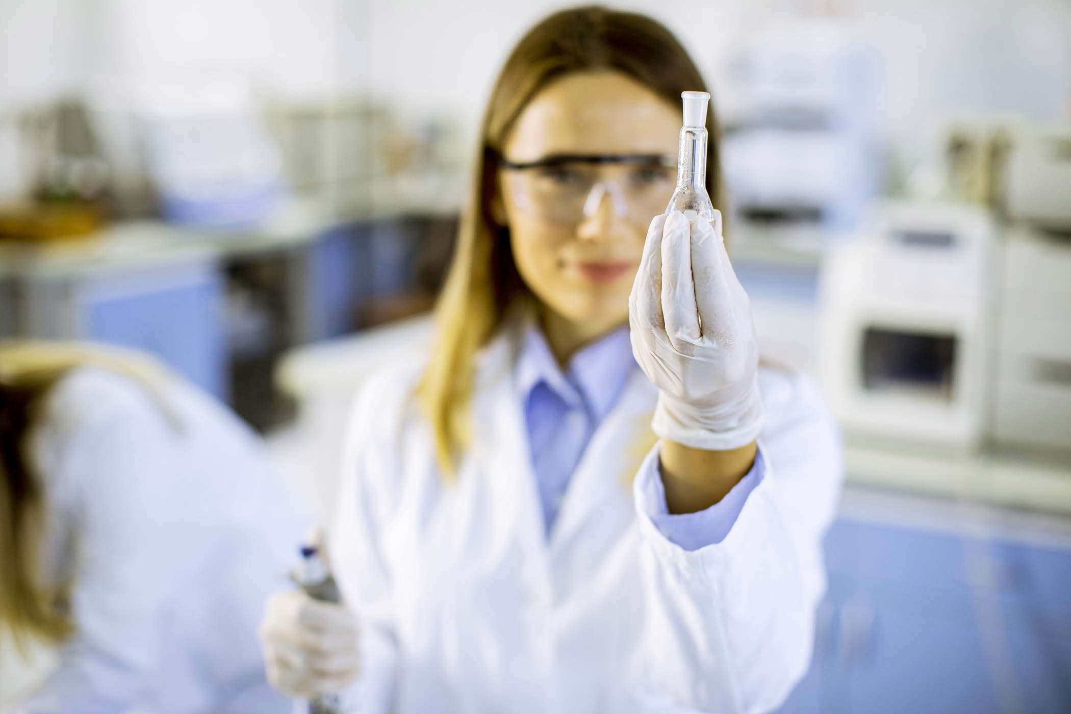 female-doctor-wearing-protective-face-mask-in-lab-BVZ6RVY.jpg